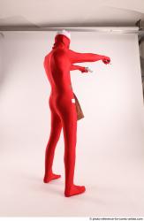 JOEL_ADAMSON CHRISTMAS VILLAIN WITH TWO GUNS